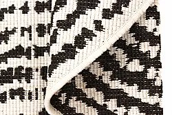 Rundt tæppe - Brussels Swirl (sort)