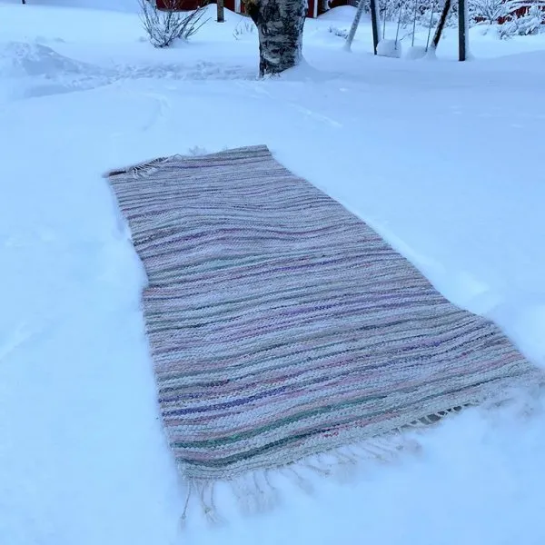 Snevask af tæppet