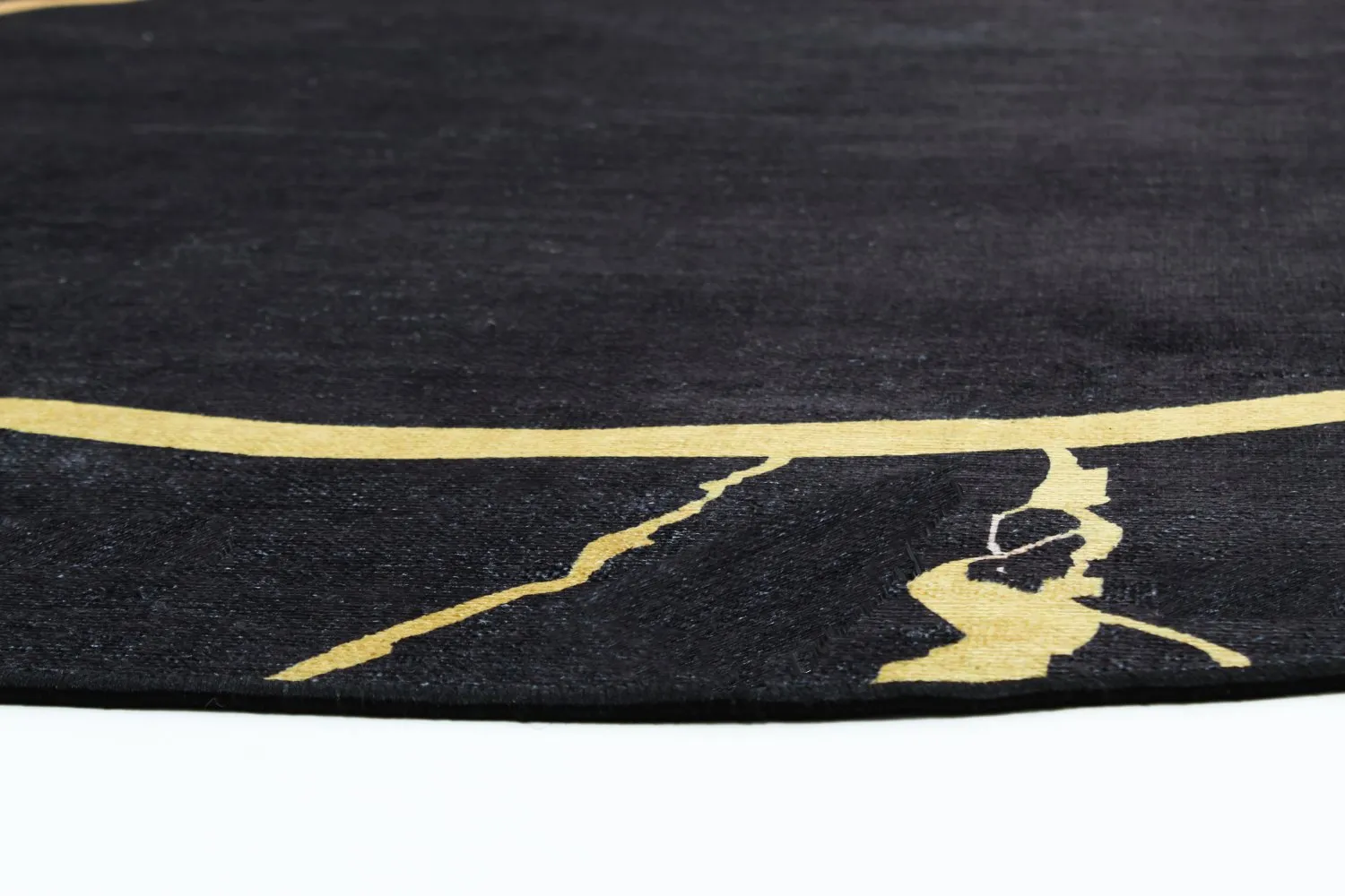 Rundt tæppe - Cerasia (sort/guld)