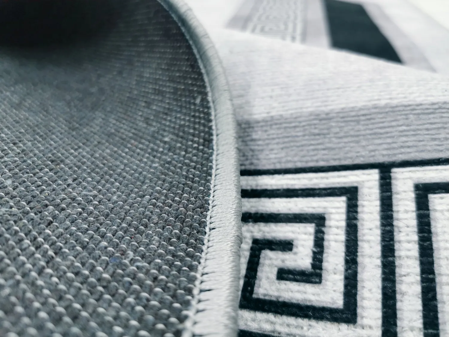 Wilton-tæppe - Olympia (sort/hvid)