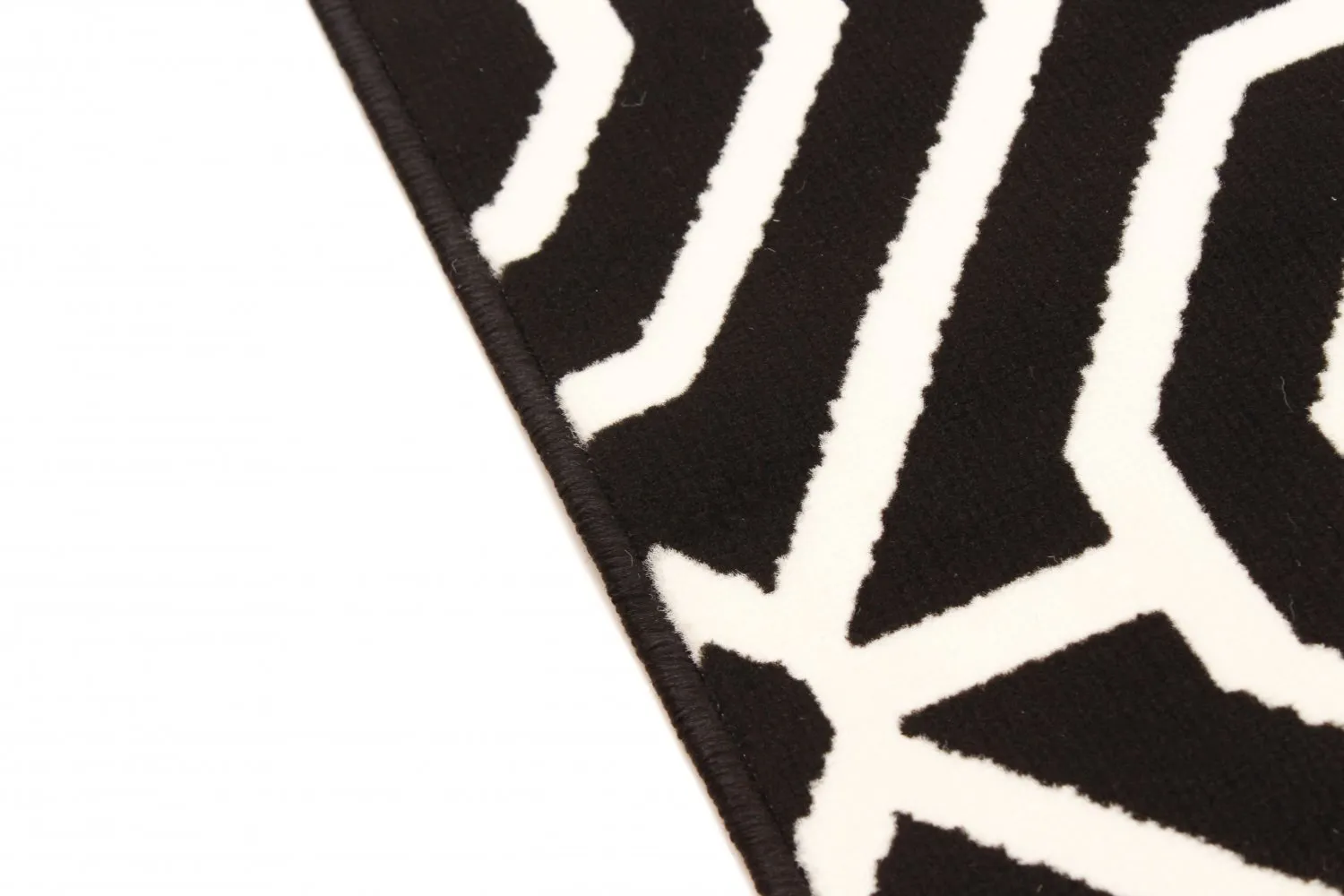 Wilton-tæppe - Florence Blackpool (sort)