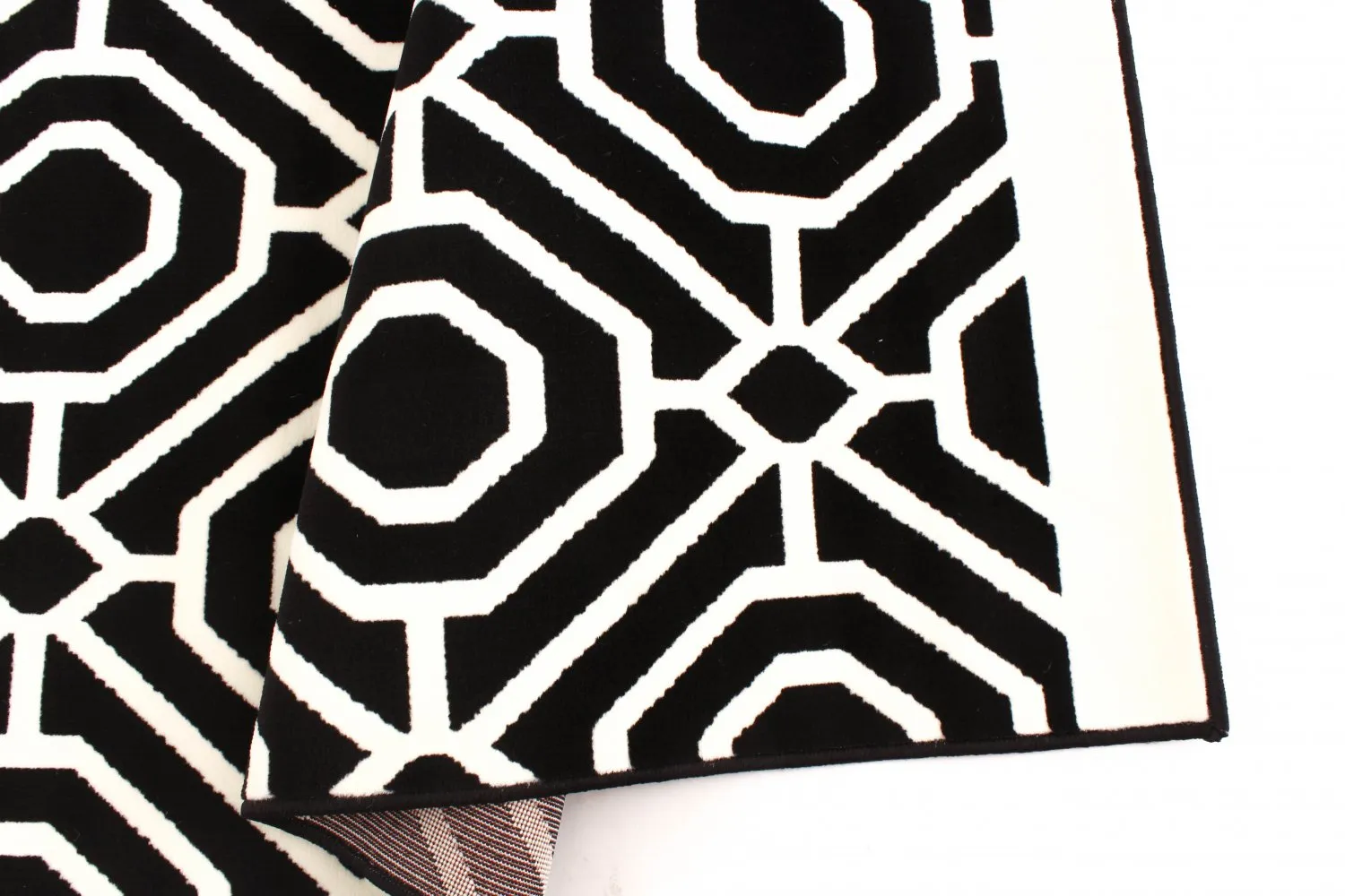 Wilton-tæppe - Florence Blackpool (sort)