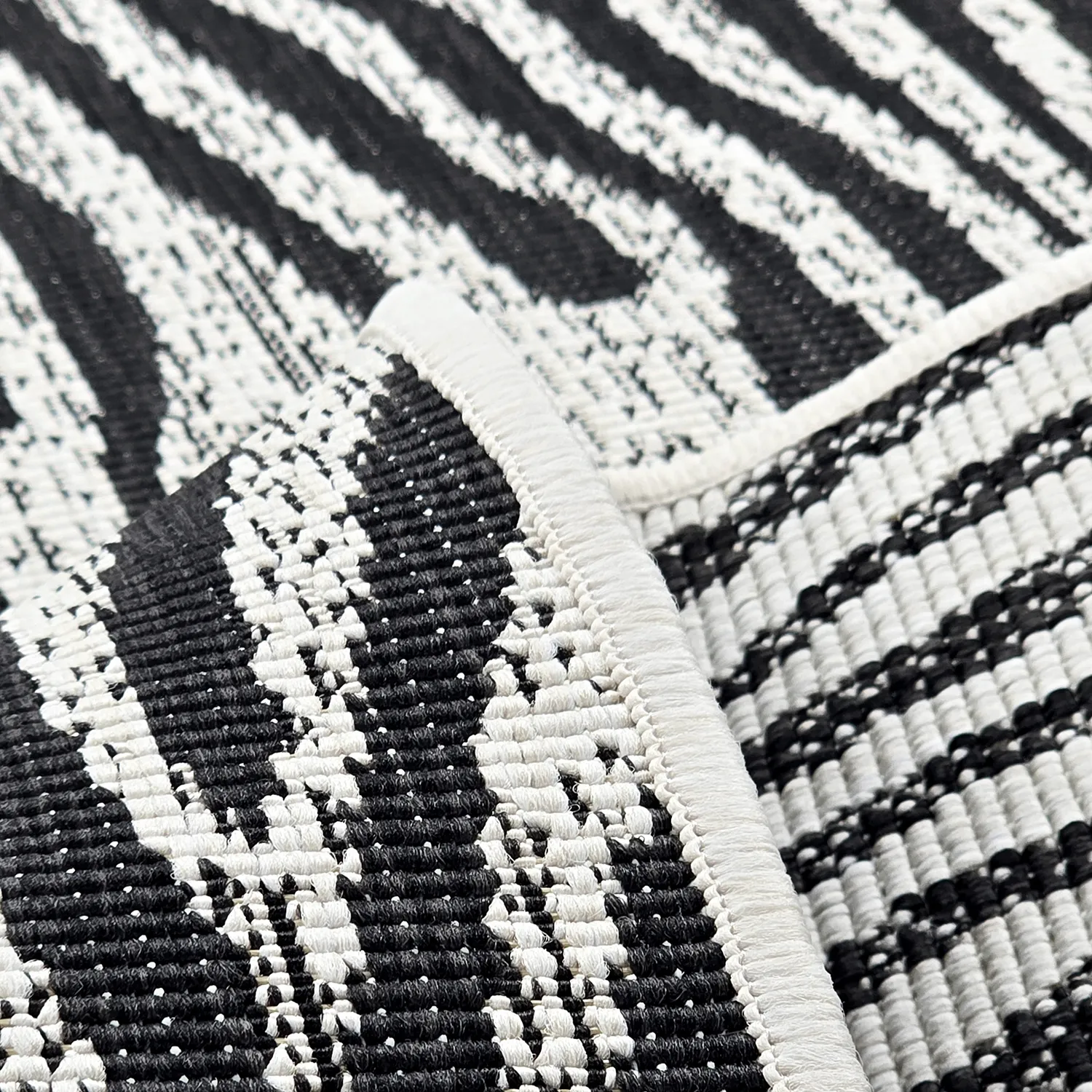 Tæpper til indendørs/udendørs brug - utomhusmatta - Vaura (sort/hvid)