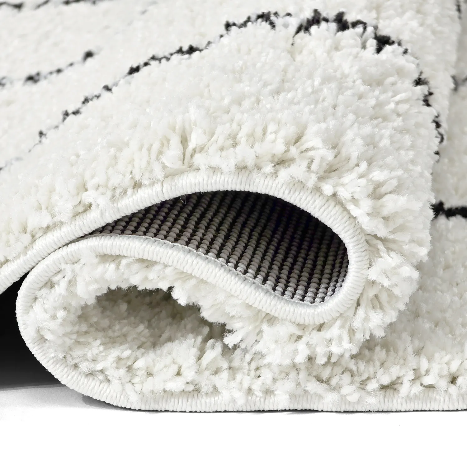 Ryatæpper - Eze (hvid/sort)