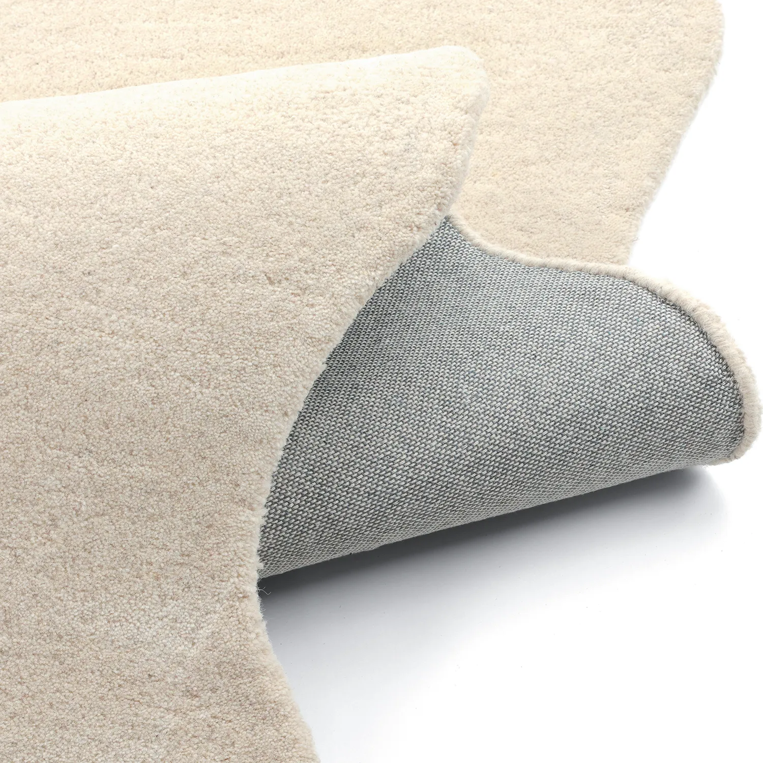 Bølget uldtæppe - Diu Hand Tufted Wool Premium (fløde)