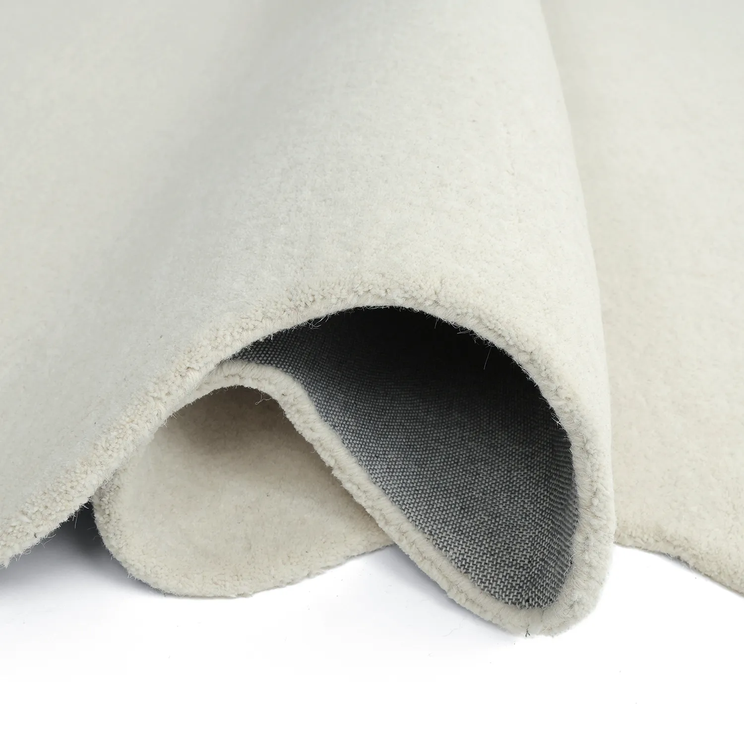 Bølget uldtæppe - Diu Hand Tufted Wool Premium (hvid)