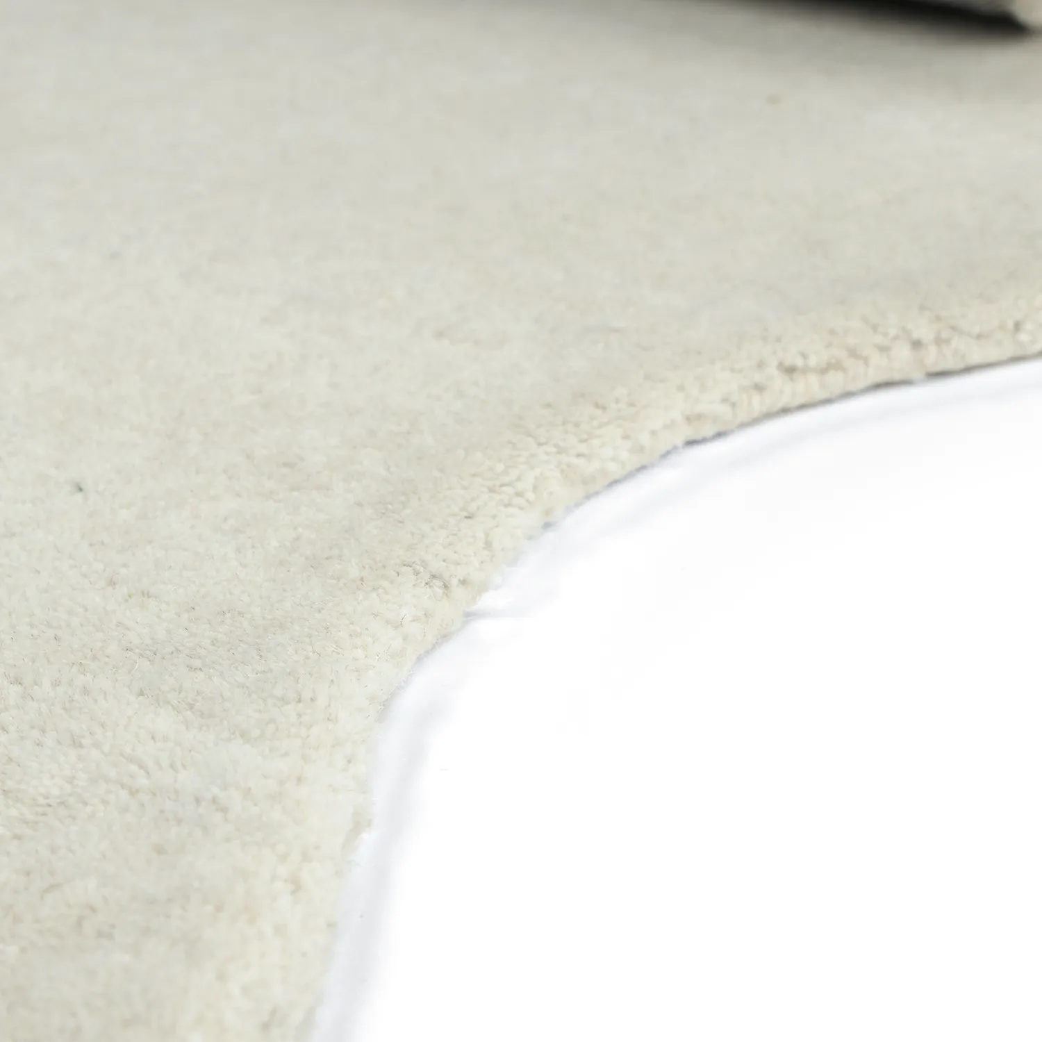 Bølget uldtæppe - Diu Hand Tufted Wool Premium (hvid)